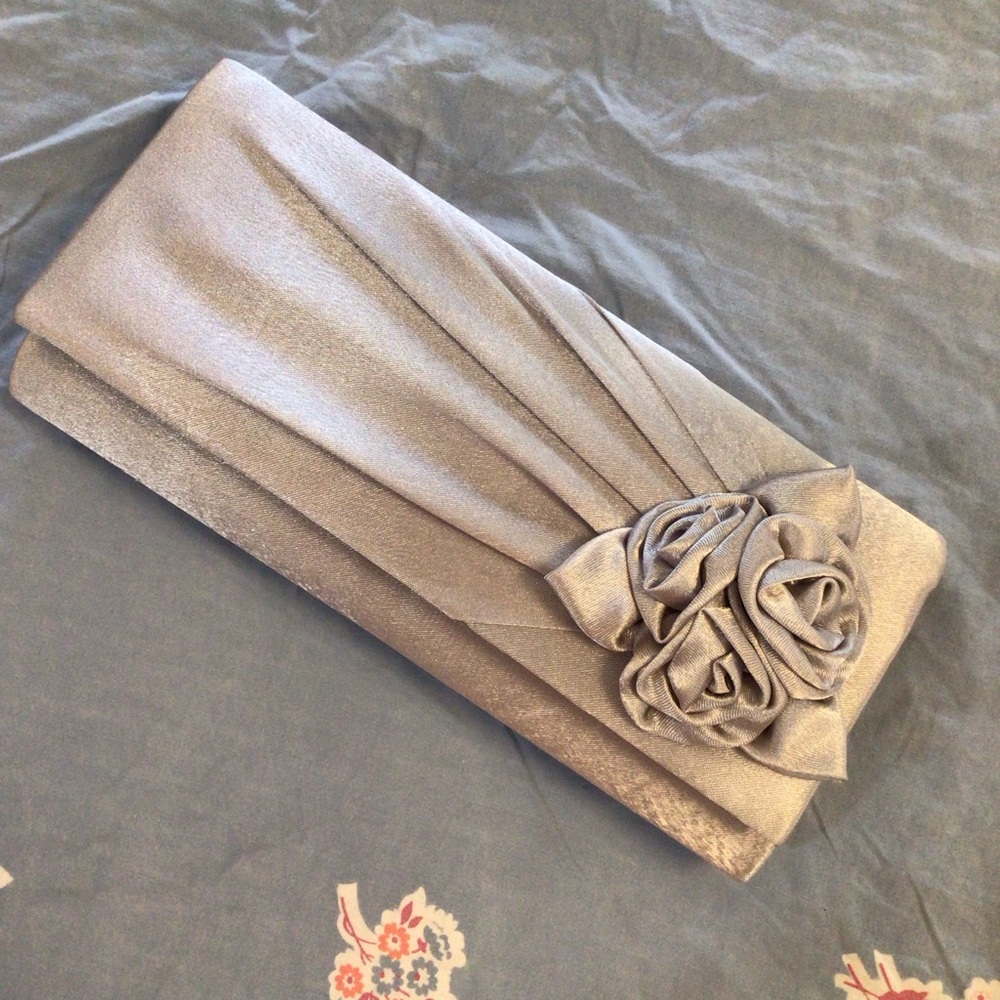 RSVP by Charming Charlie convertible clutch